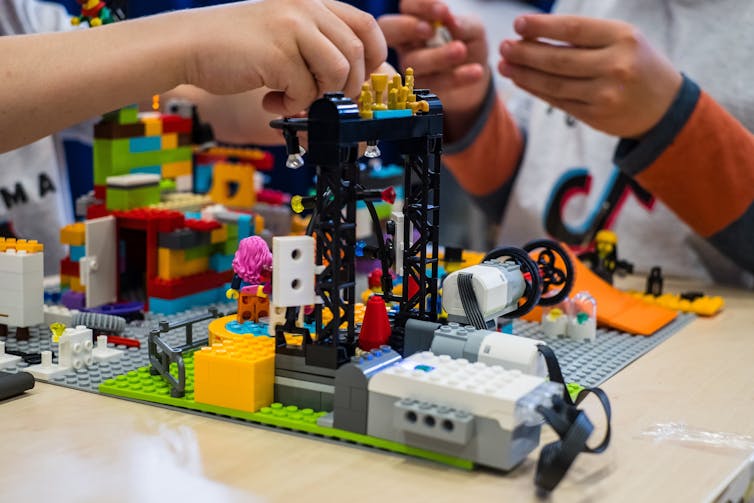 Children build with lego