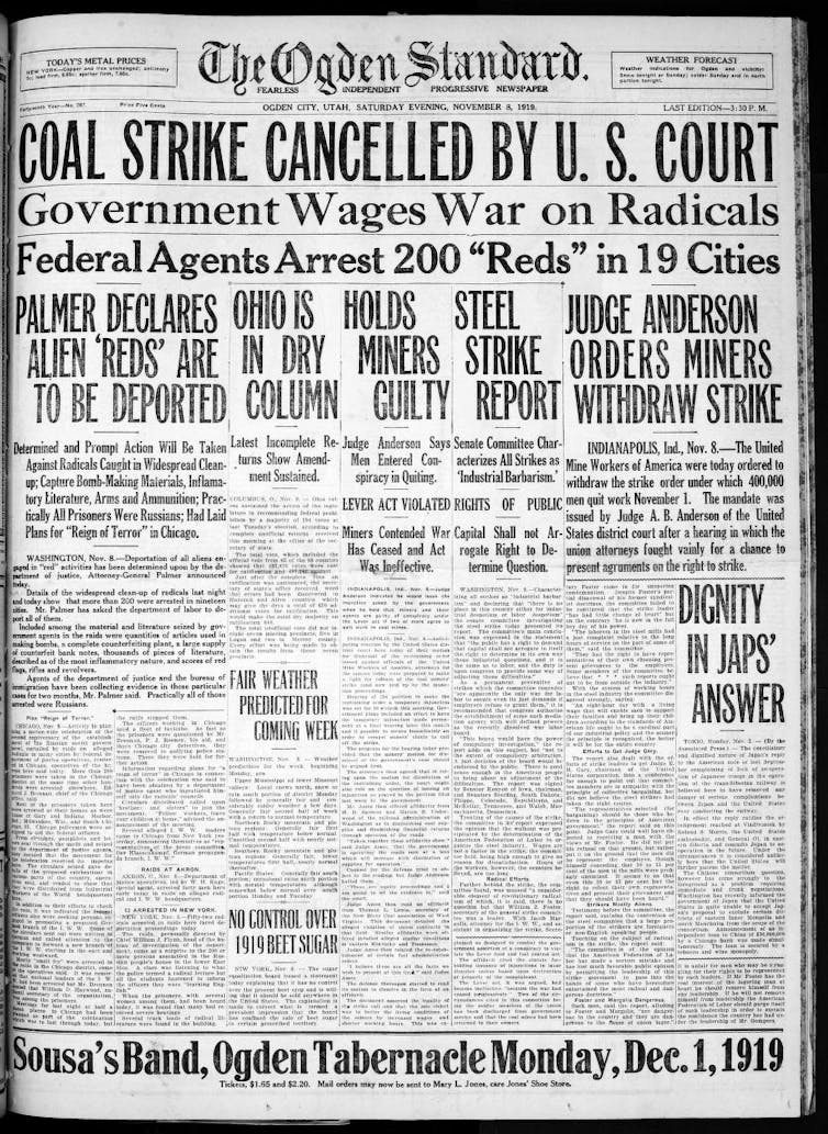A newspaper from 1919 announcing the arrest and planned deportation of 'alien Reds.'