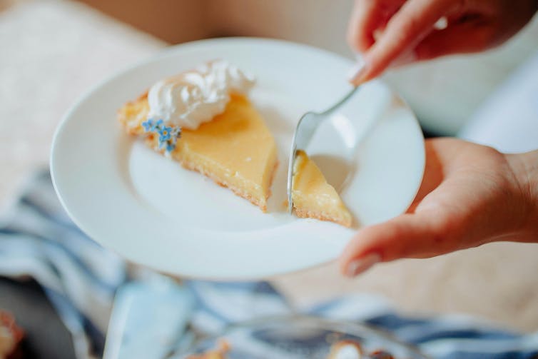 lemon slice on plate with fork