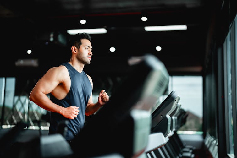 A man running on a treadmill.