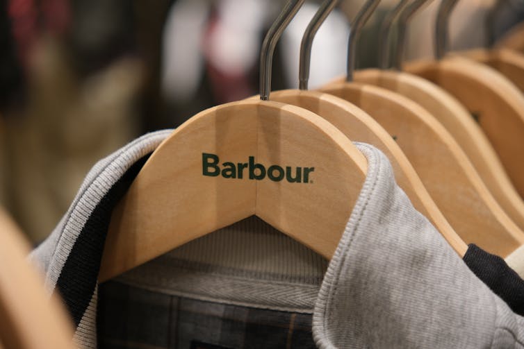rail of Barbour clothing in a shop