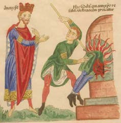 The antichrist instructs a man to put someone into a burning oven.